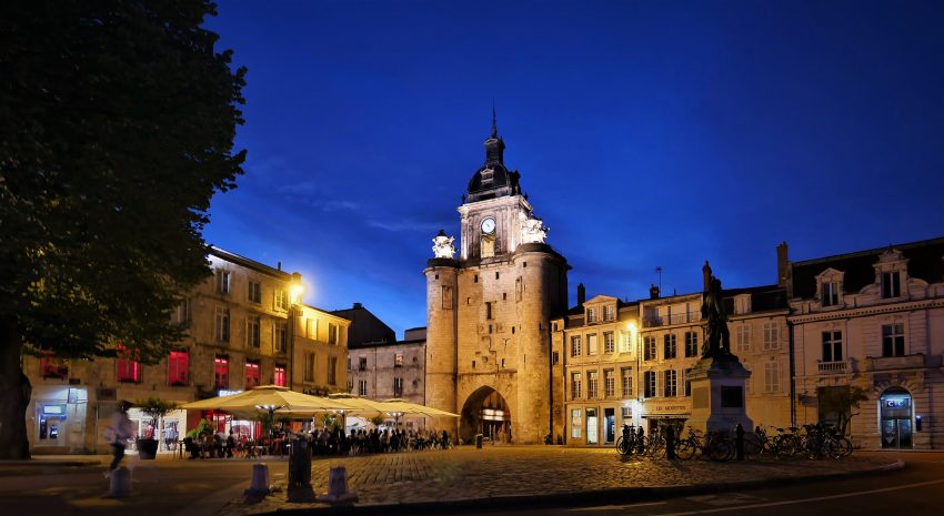 Porte de la Grosse Horloge evening